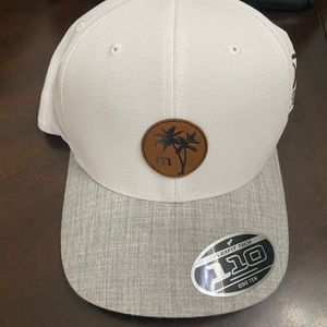 Travis Mathew white logo hat